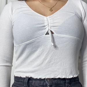 Long sleeve white shirt.